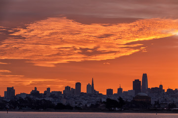 San Francisco skyline at orange sunrise, California
