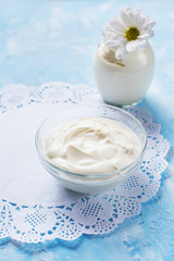 Obraz na płótnie Canvas Homemade yogurt on a gentle blue background. Healthy healthy food. 