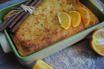 Rice pudding with orange and cinnamon. Rice curd casserole with spices. Traditional English Recipe