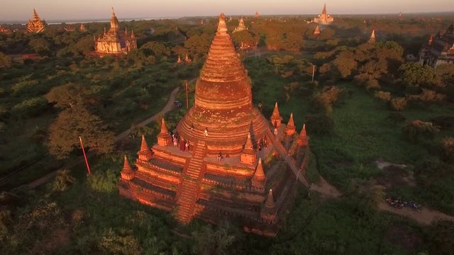 Bagan, Myanmar (Burma), aerial view of ancient temples and pagodas at sunset.