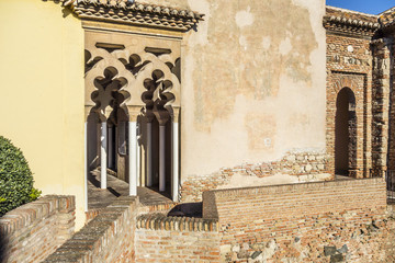 MALAGA, SPAIN- JANUARY 22,2018: Historic monument, La Alcazaba,palatial fortification. Multifoil arch.Malaga, Spain.