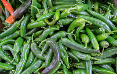 Hot green chilli peppers sold at city farmers market
