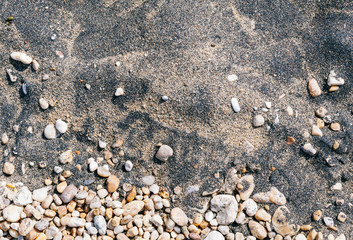 Dark sand with small stones