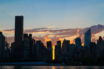 Fototapeta premium Skyline of the east side of midtown Manhattan at sunset