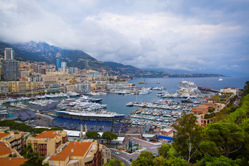 Naklejka premium Monaco, panoramic view of port de Fontvieille. French riviera, azur coast. Bay with a lot of luxury yachts.