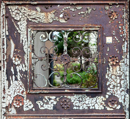 Old rusted gate decor element.