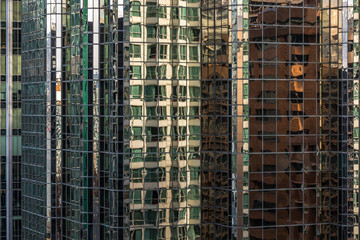 Fototapeta na wymiar Reflections on glass buildings.
