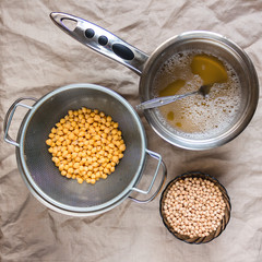 Aquafaba made of chickpea on rustic textile. Replace egg in baking for vegan recipe. Healthy diet concept.