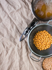 Aquafaba made of chickpea on rustic textile. Replace egg in baking for vegan recipe. Healthy diet concept.