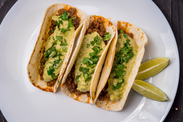 Mexican tacos with beef and guacamole