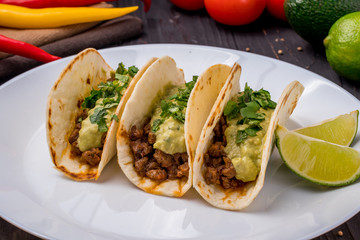 Mexican tacos with beef and guacamole