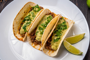 Mexican tacos with beef and guacamole