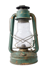 An old vintage green rustic kerosene lamp on a white background, isolated