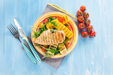 Grilled chicken breast with vegetables and polenta