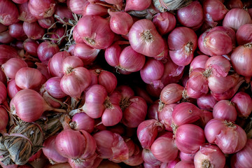 lot of Shallots on the table for raw material