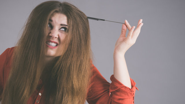 Woman having tangled hair