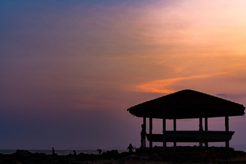 The sun sets over the Ocean.