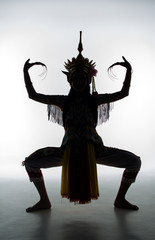 Fototapeta premium The lady in Southern thai classical dancing suit is posing on white background.