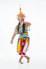 The lady in Southern thai classical dancing suit is posing on white background.