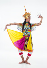 The lady in Southern thai classical dancing suit is posing on white background.