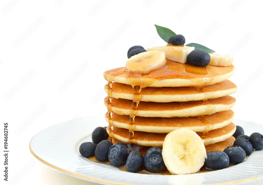 Wall mural stack of pancakes with fresh blueberry on white