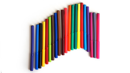 multi-colored felt-tip pens on the white isolated background, 18 colors.