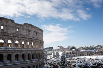Snow covers the streets of Rome, Italy. Piazza del Colosseo comes alive with hundreds of people who went to celebrate the event.