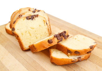 Top View of a Chocolate Chip Muffin Isolated on wooden board