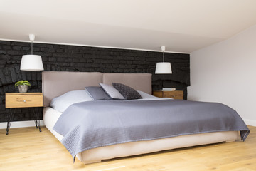 Grey cozy bedroom interior