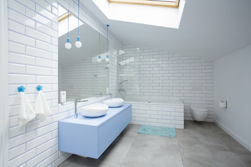 White bathroom on the attic