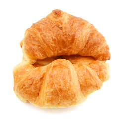 Fresh and tasty croissant over white background