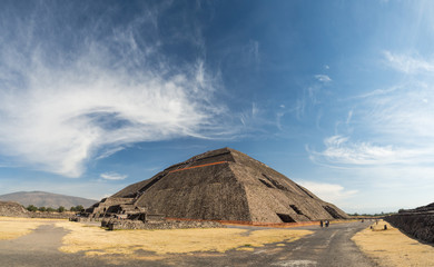 Fototapeta na wymiar Teotihuacan, Mexico City, Mexico, South America - January 2018 [The Great Pyramid of Sun and Moon, views on ancient city ruins of Teotihuacan pyramids valley, The Road of Dead]