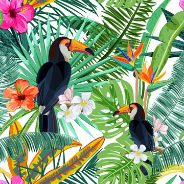 Vector seamless pattern with green tropical palm leaves, hibiscus flowers and bird toucan. Nature background. Summer or spring trendy design elements for fashion textile prints and greeting cards.