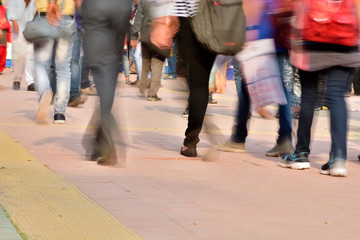 Business people are walking on city road