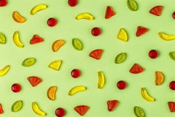 Colorful candies pattern on a bright background.