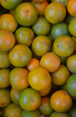 Orange fruit background, top view
