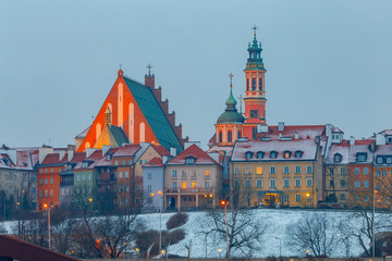 Obraz premium Warszawa. Widok na stare miasto o zachodzie słońca.