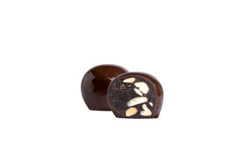 chocolate candy macro shot with nuts and delicious filling on white background, isolates