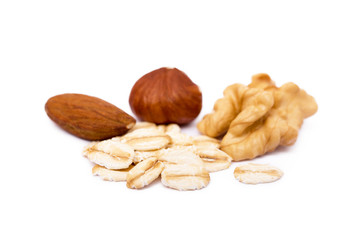 Mix nuts and oatmeal isolated on white background
