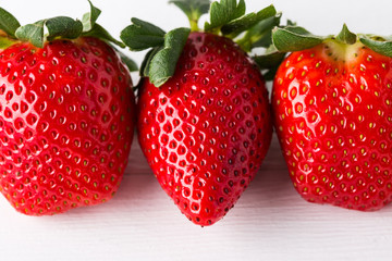 strawberry on a white wooden table
