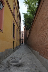 The narrow street in Madrid.