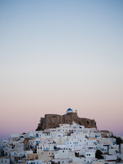 After sunset in Astypalaia ,Greece with a close up of the castle and the traditional white houses