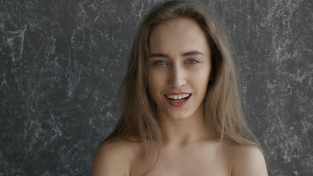 Naked gorgeous girl is surprised