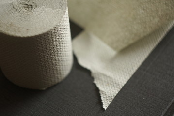 toilet paper roll on dark background 