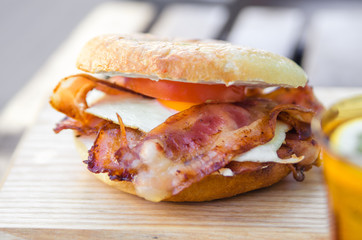 Bagel with bacon and egg