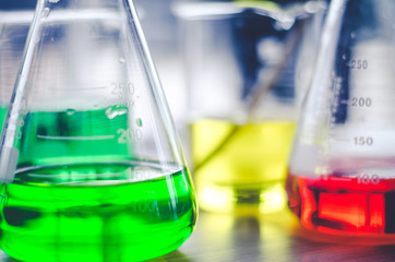 three erlenmeyer flask , Glassware on  science laboratory research and development