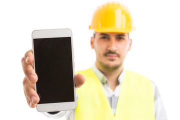 Architect or engineer showing empty blank phone screen or display.