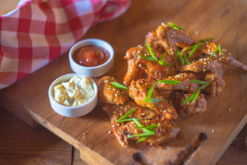 Grilled chicken wings with hot sauce