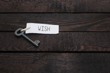 key with inscription Wish