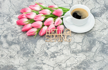 Coffee pink tulip flowers Hello spring Floral flat lay